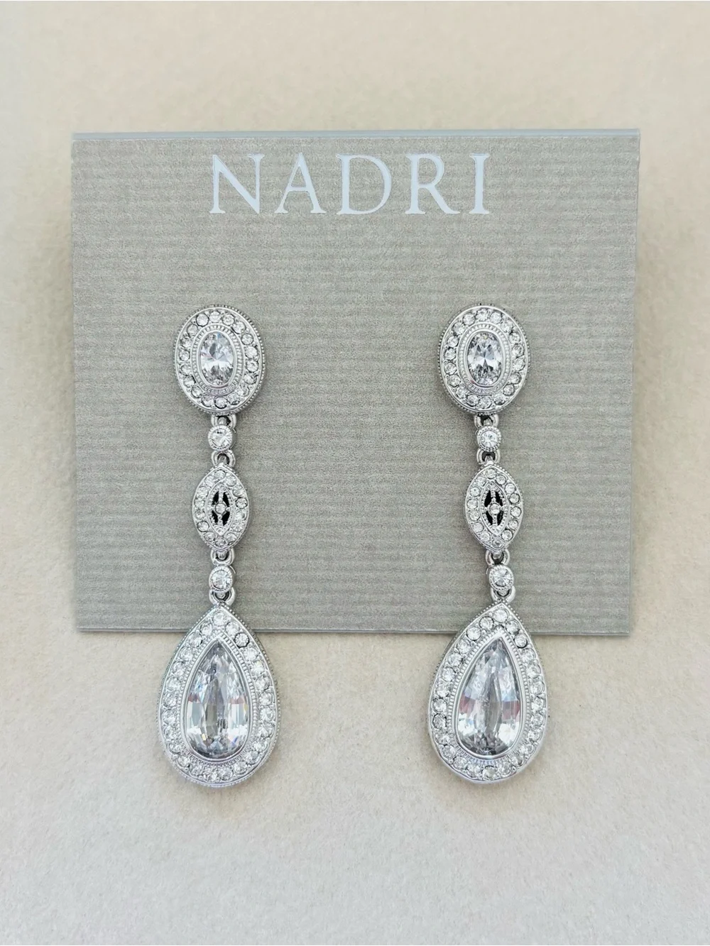 Nadri Silver Pear Shaped Dangle Earrings